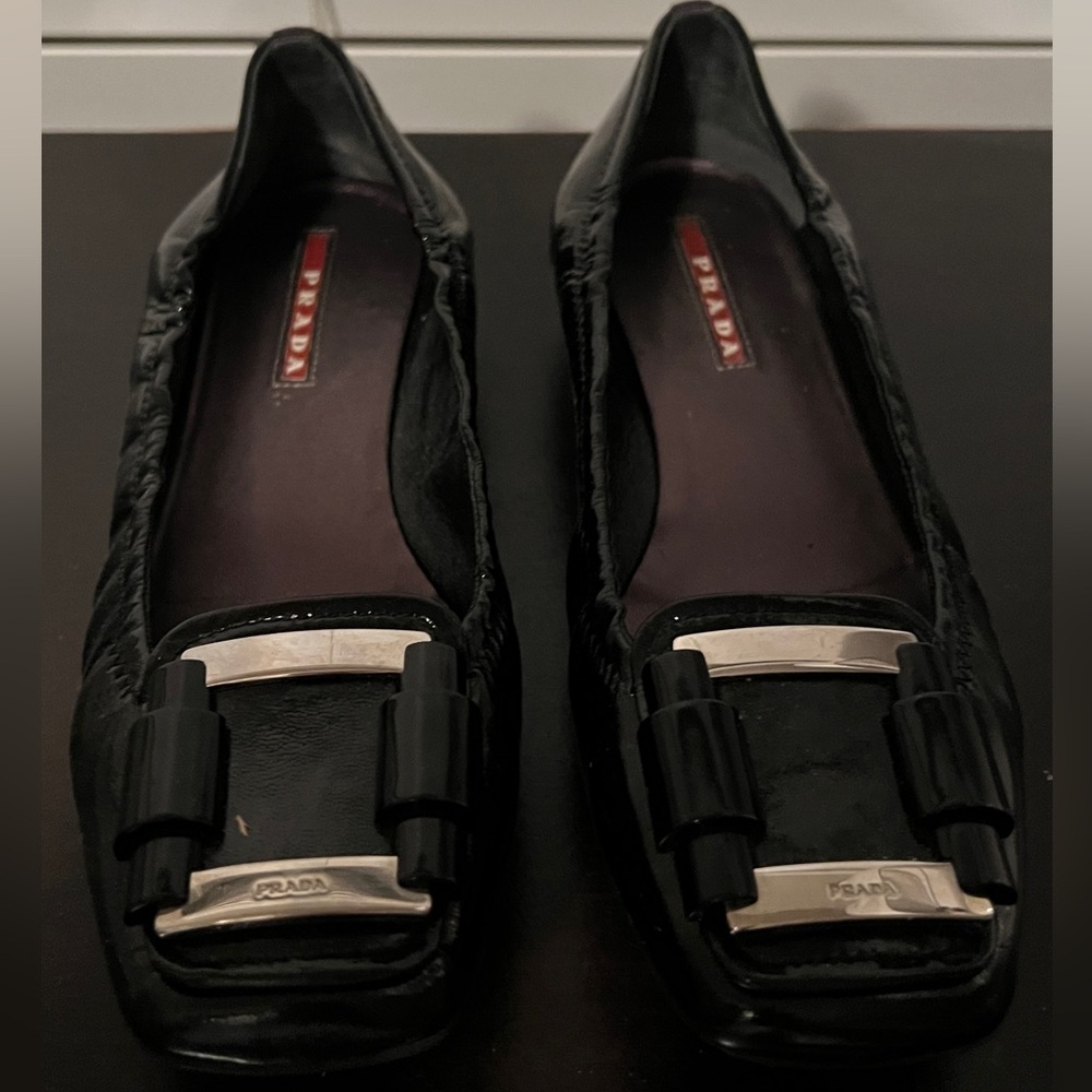 Prada Black Leather Flats with Silver Hardware